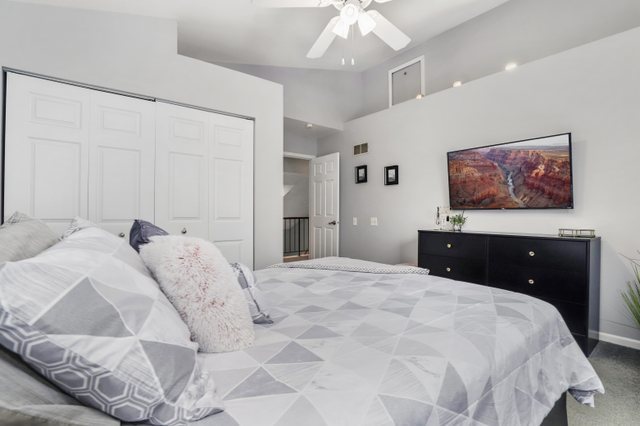 43 North Oltendorf Road Streamwood, IL 60107 - Photo 17 of 22 a bedroom with a bed and a chandelier