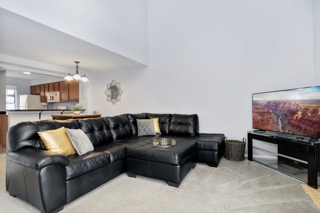 43 North Oltendorf Road Streamwood, IL 60107 - Photo 10 of 22 a living room with furniture and a flat screen tv