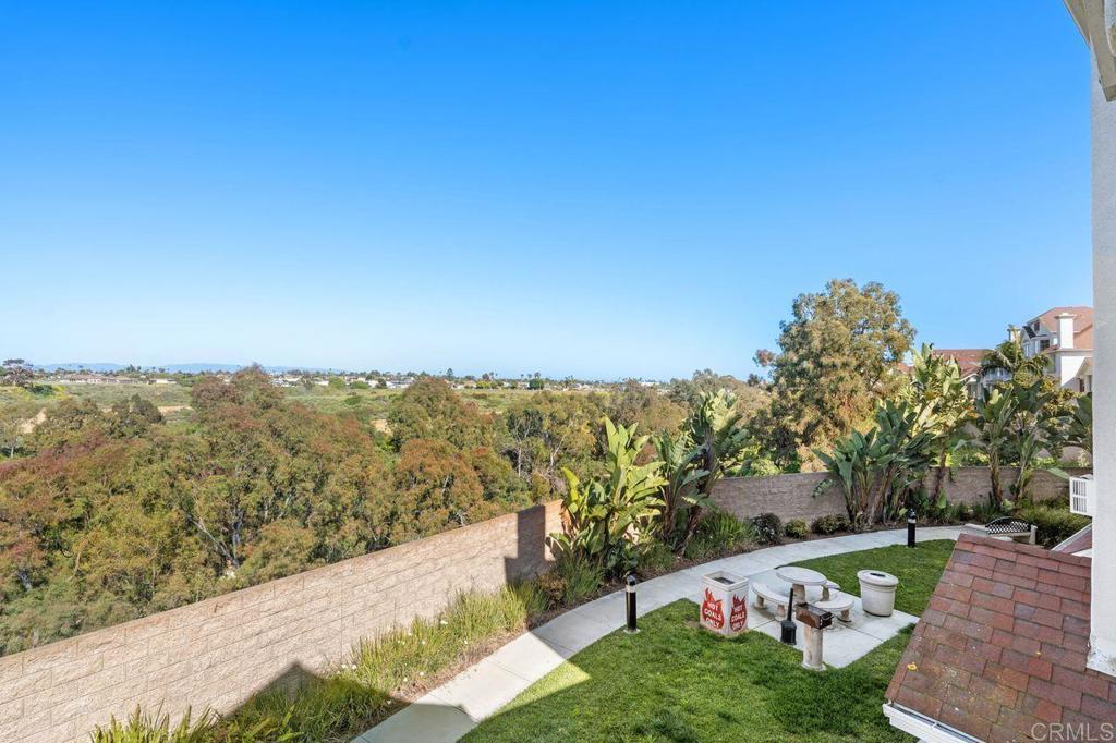 810 Harbor Cliff Way, Unit 225 Oceanside, CA 92054 - Photo 20 of 43 a view of a yard and mountain view in back