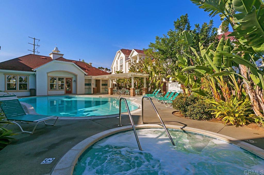 810 Harbor Cliff Way, Unit 225 Oceanside, CA 92054 - Photo 2 of 43 a view of a house with a yard