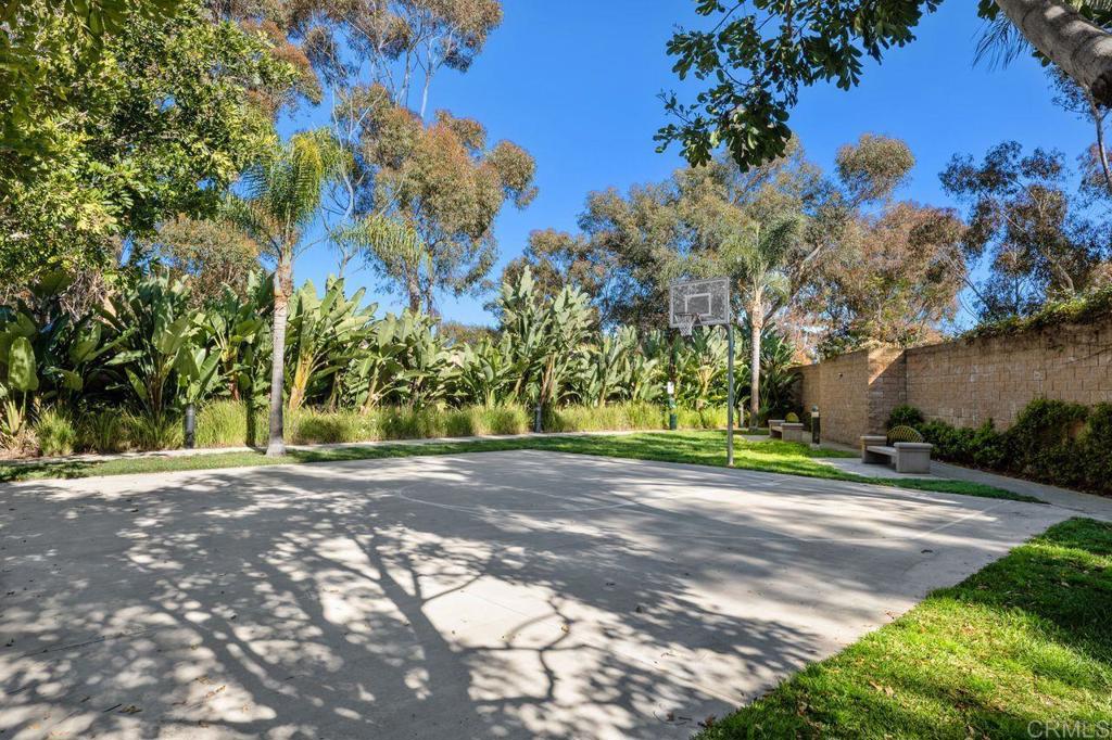 810 Harbor Cliff Way, Unit 225 Oceanside, CA 92054 - Photo 3 of 43 a view of a house with a tree in the background