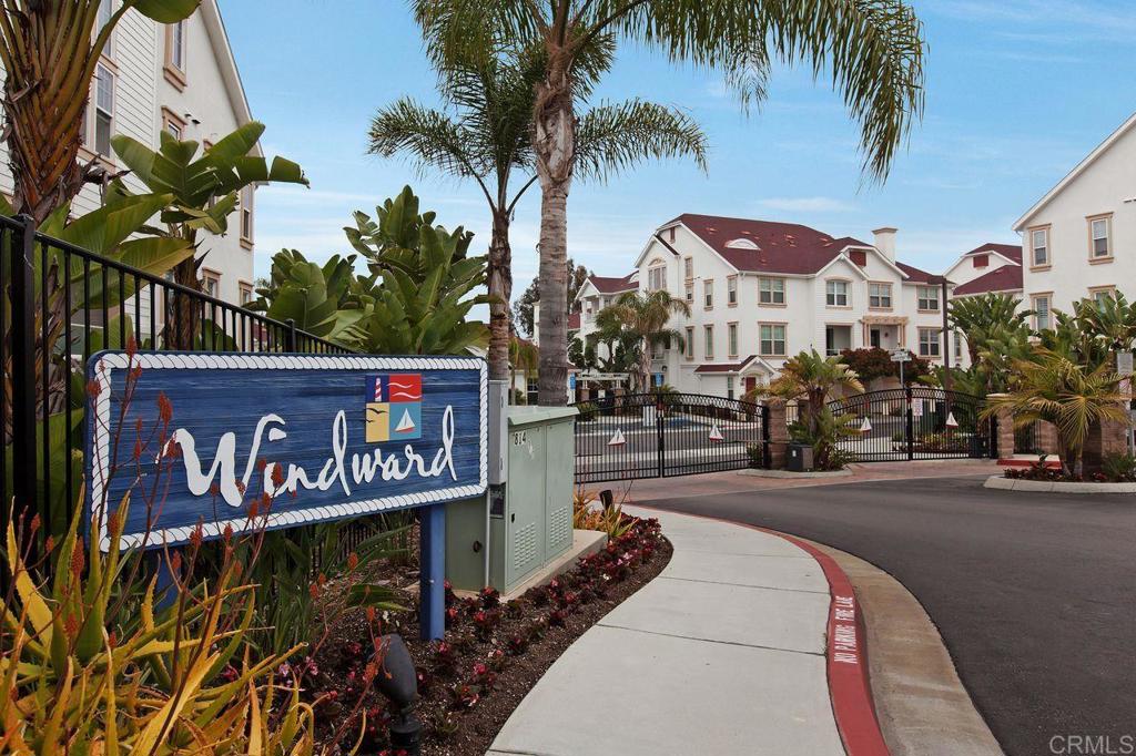 810 Harbor Cliff Way, Unit 225 Oceanside, CA 92054 - Photo 4 of 43 a street sign on a wall next to road