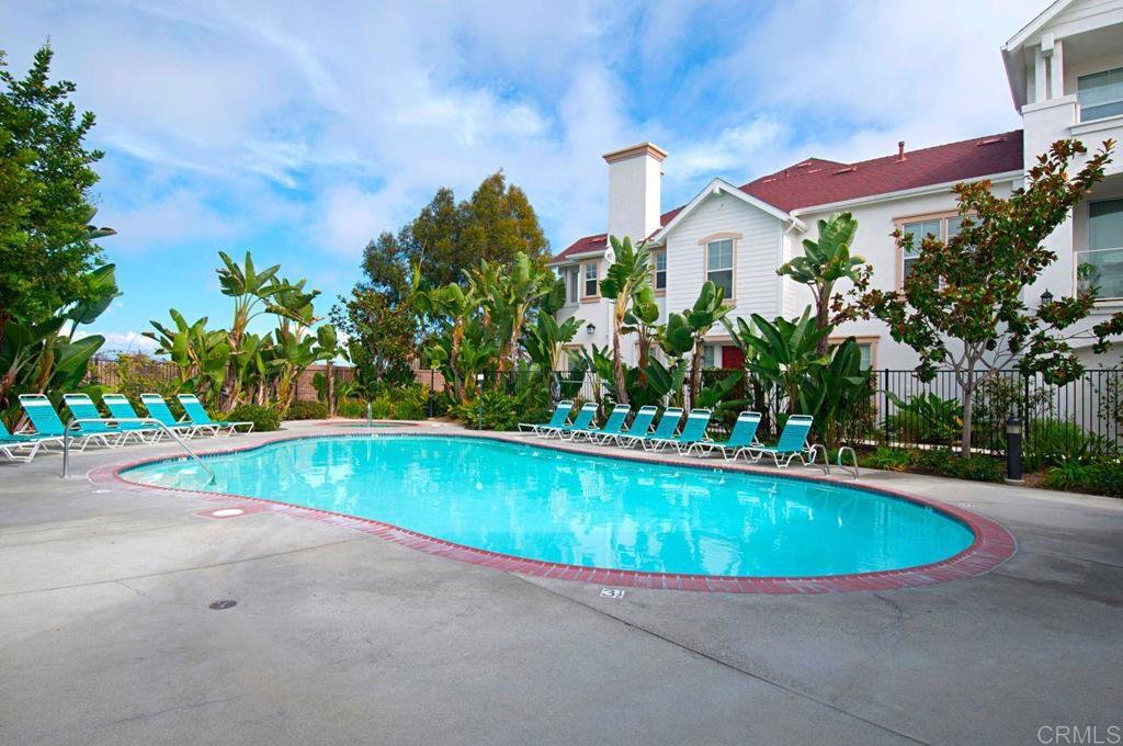 810 Harbor Cliff Way, Unit 225 Oceanside, CA 92054 - Photo 7 of 43 a view of a swimming pool with a yard