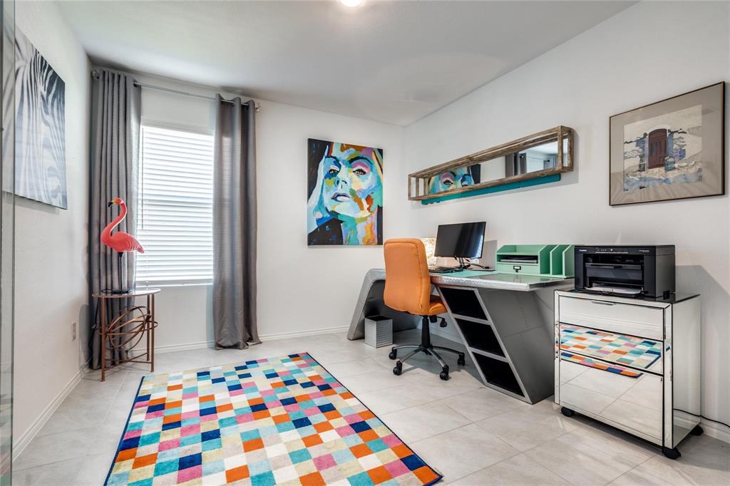 7733 Ruellia Road McKinney, TX 75071 - Photo 10 of 19 Home office with light tile patterned floors and baseboards