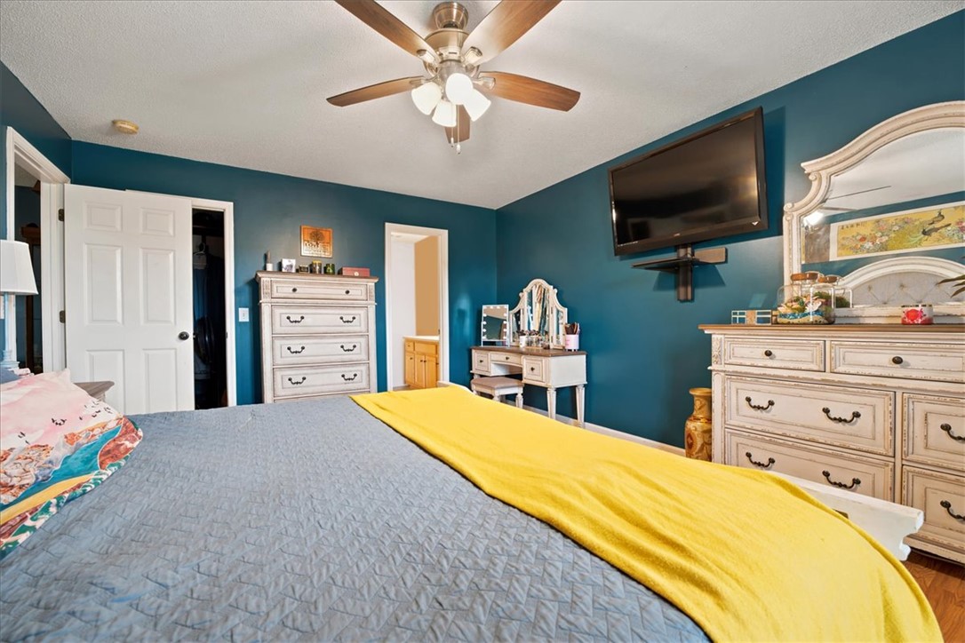 520 Sharon Lane Seneca, SC 29678 - Photo 23 of 48 A comforting bedroom features a ceiling fan, hardwood flooring, and ample space for relaxation.