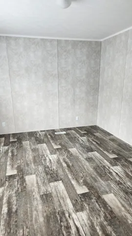 a view of a room with an empty space