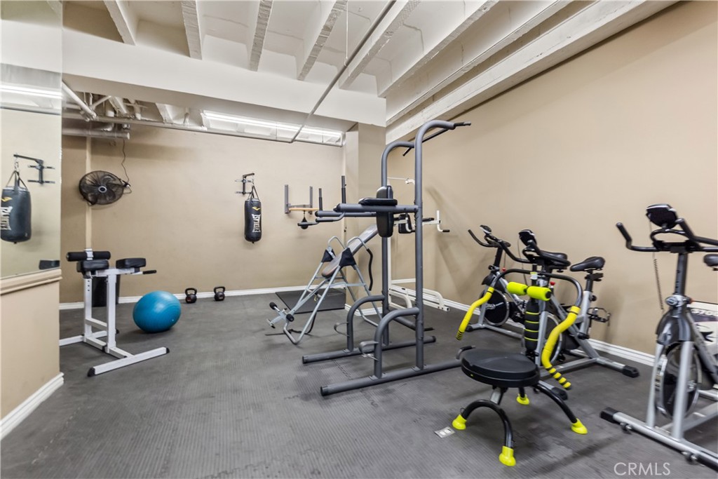 312 West 5th Street Los Angeles, CA 90013 - Photo 13 of 19 a view of a room with gym equipment