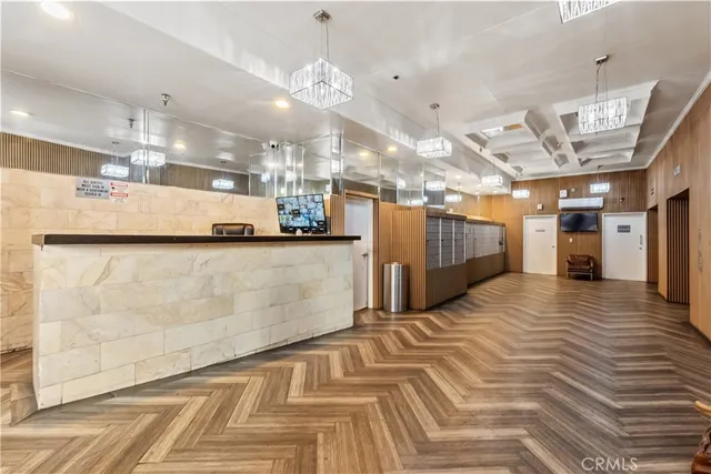 a view of a room with a refrigerator