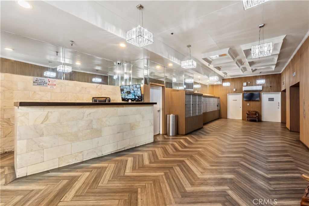 312 West 5th Street Los Angeles, CA 90013 - Photo 2 of 19 a view of a room with a refrigerator