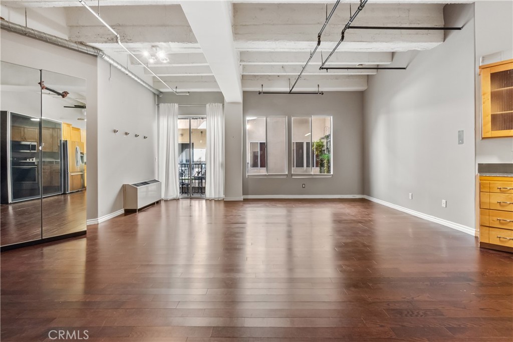 312 West 5th Street Los Angeles, CA 90013 - Photo 3 of 19 a view of an entryway with wooden floor