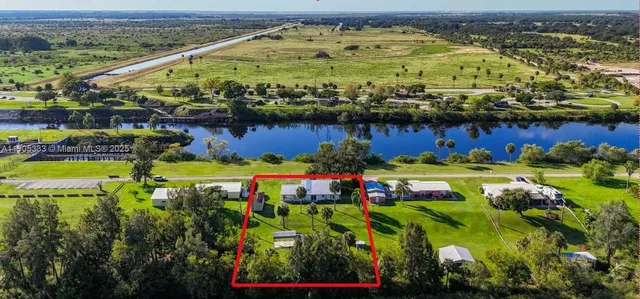 a view of a water with a building in the background