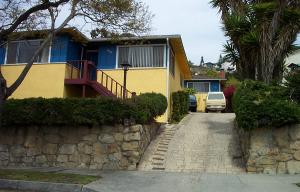 616-618 Chiquita Road Santa Barbara, CA 93103 - Photo 1 of 1 a front view of a house with garden
