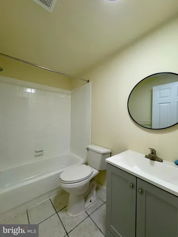 a kitchen with a stove top oven sink and cabinets