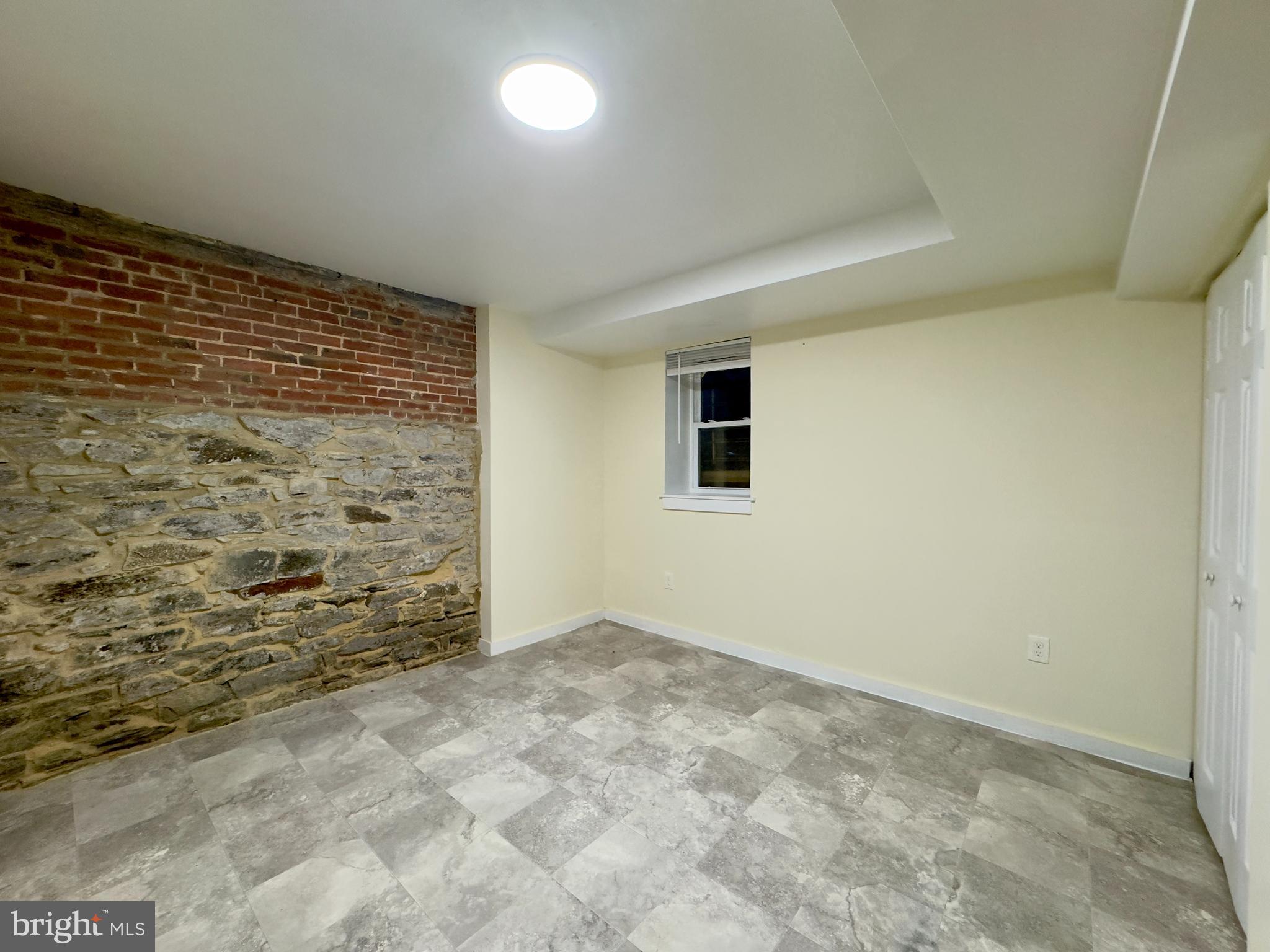 2102 Maryland Avenue Baltimore, MD 21218 - Photo 6 of 14 a view of an empty room