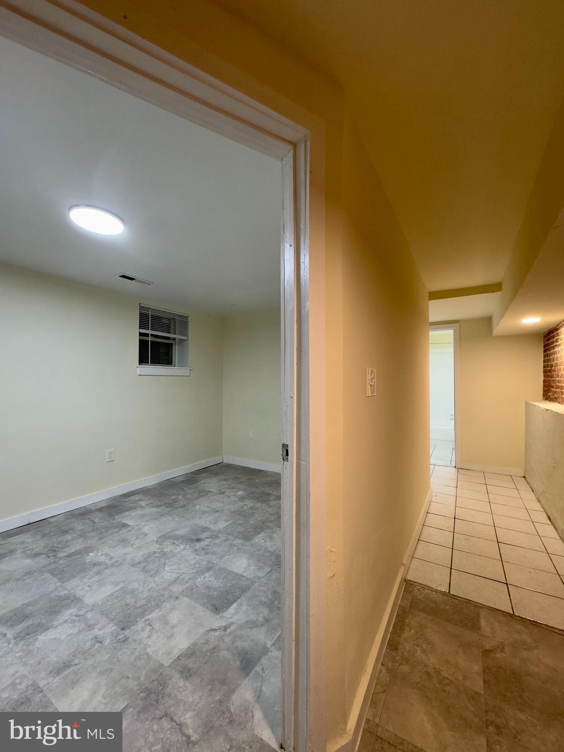 2102 Maryland Avenue Baltimore, MD 21218 - Photo 7 of 14 a view of an empty room and a bathroom