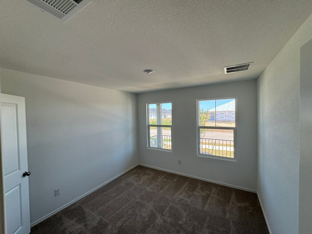 134 Avre Loop Kyle, TX 78640 - Photo 3 of 9 Secondary bedroom