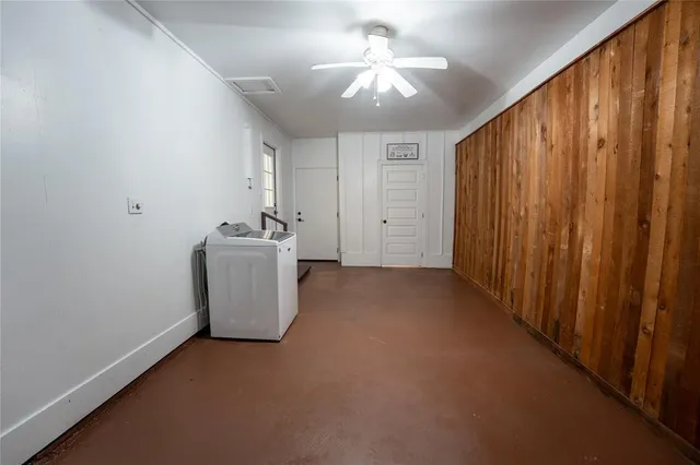 wooden floor in an empty room and a window