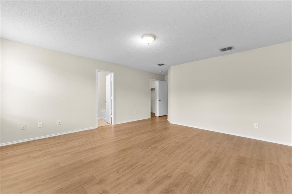 2633 Salt Maker Way Little Elm, TX 75068 - Photo 15 of 40 a view of an empty room