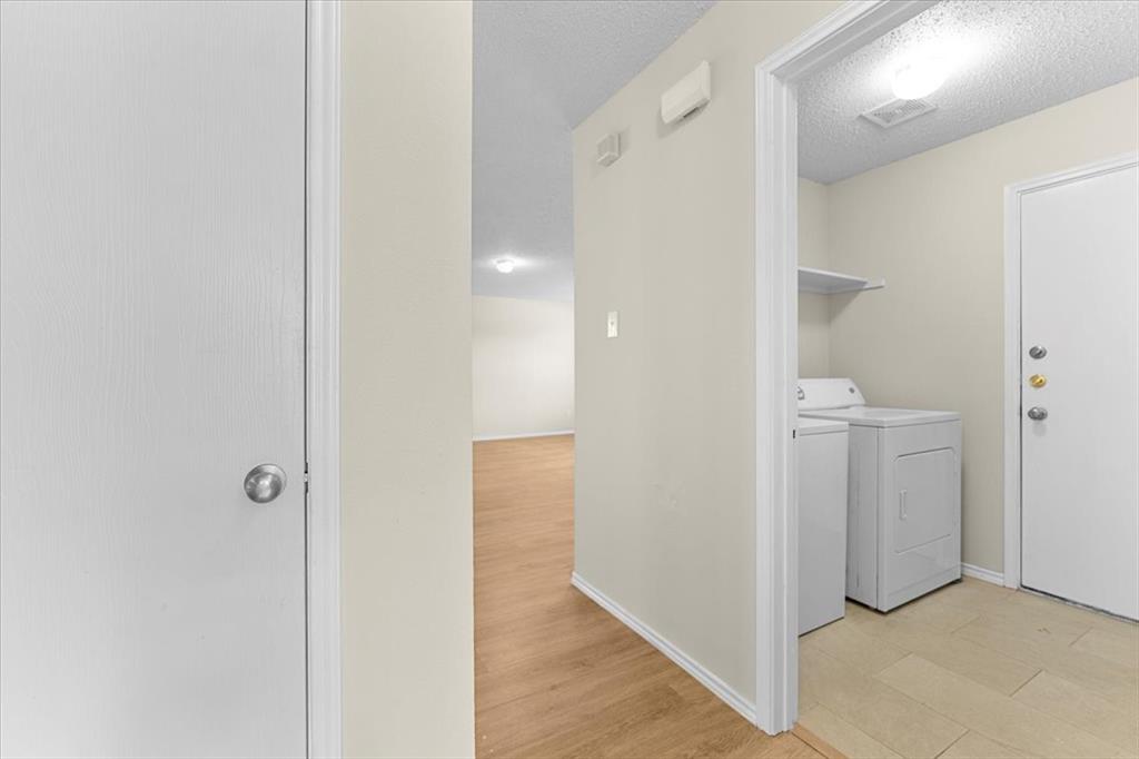 2633 Salt Maker Way Little Elm, TX 75068 - Photo 34 of 40 a view of a hallway with an empty room