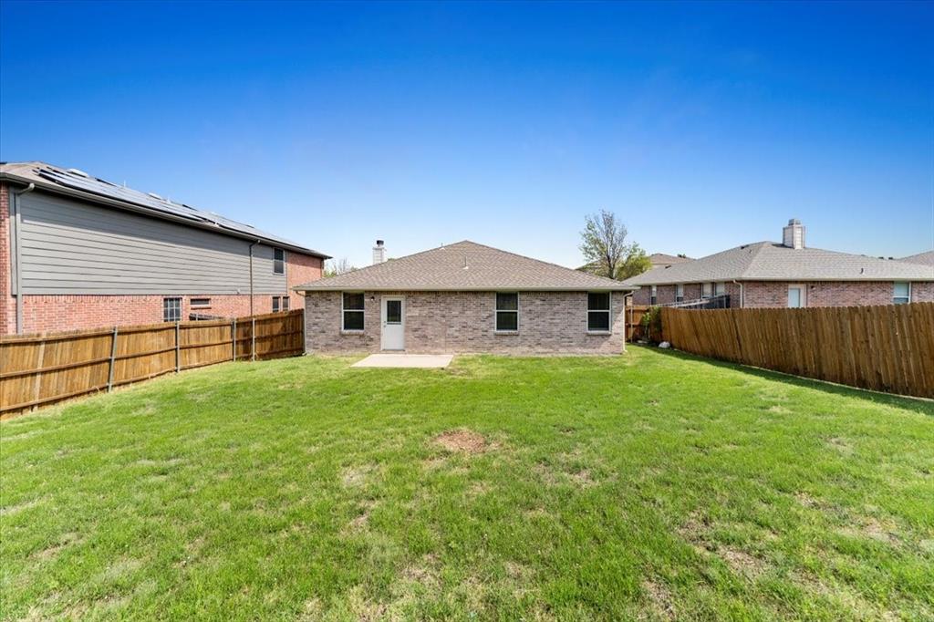 2633 Salt Maker Way Little Elm, TX 75068 - Photo 38 of 40 a front view of a house with garden