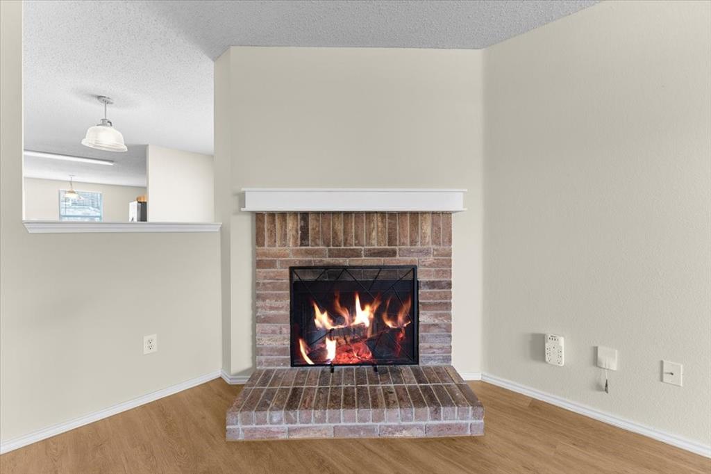 2633 Salt Maker Way Little Elm, TX 75068 - Photo 40 of 40 a living room with a fireplace