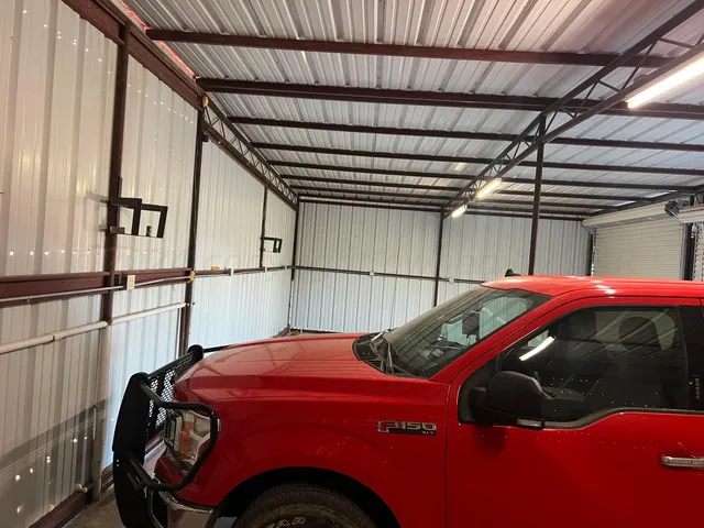 a bathroom with a sink toilet and a mirror