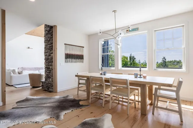 a bedroom with a bed and lamp