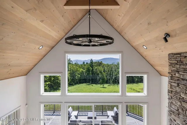 a bedroom with a bed and a desk