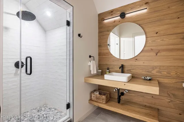 a kitchen with stainless steel appliances granite countertop a sink and a stove