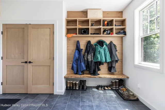 a table and chairs in front of a house