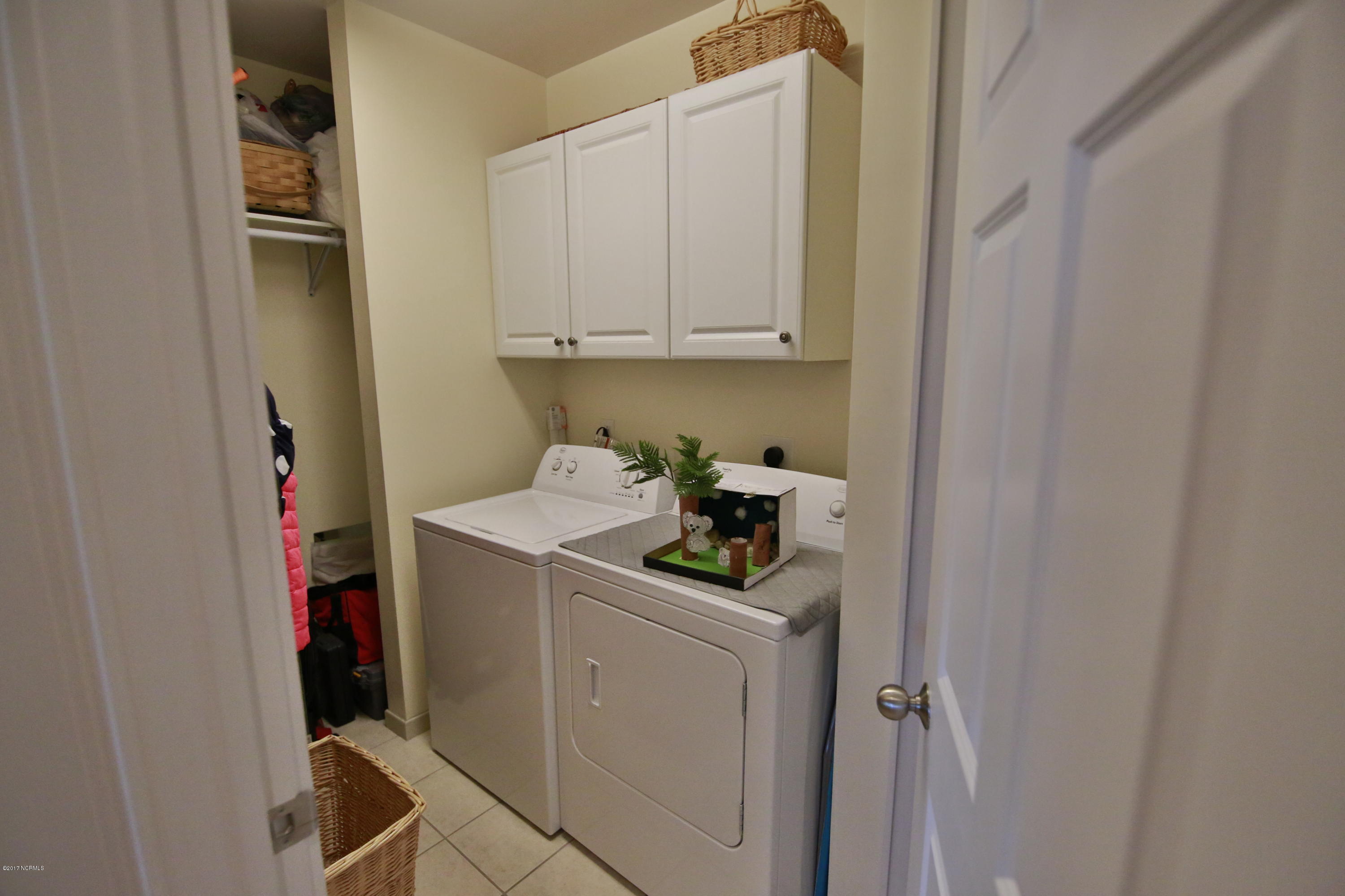 150 Lands End Road, Unit C32 Morehead City, NC 28557 - Photo 16 of 25 Large Laundry Room With Storage