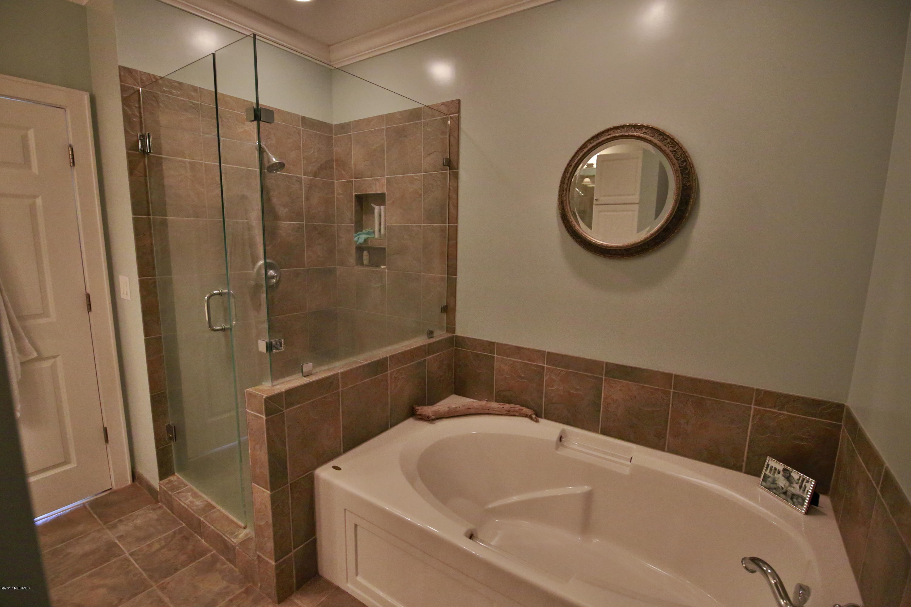 150 Lands End Road, Unit C32 Morehead City, NC 28557 - Photo 5 of 25 Walk-in, Tiled, and Glassed Shower and Garden Tub