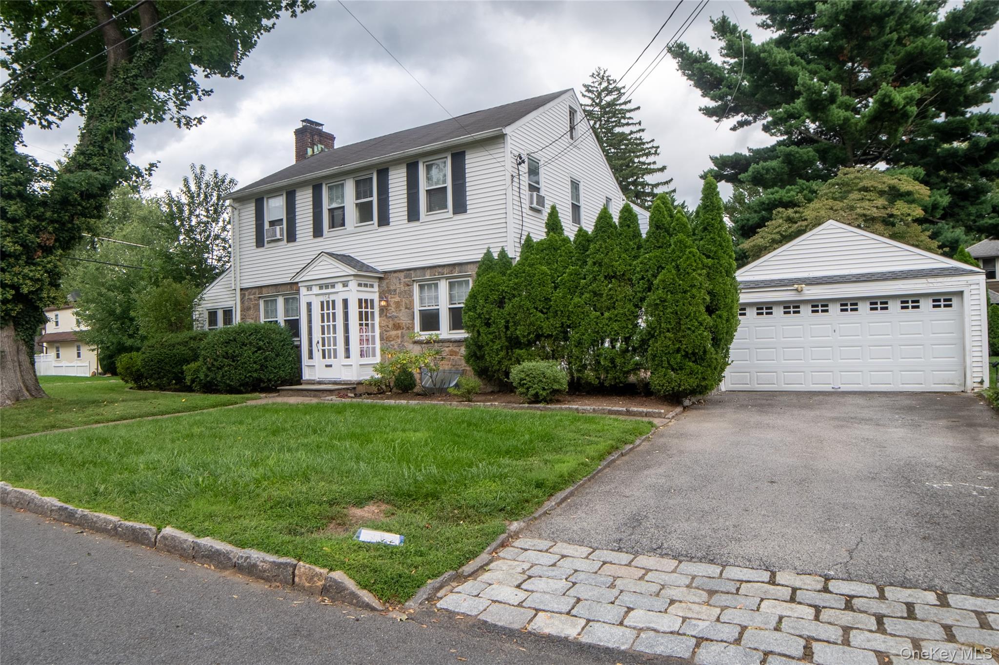 154 Bell Road Scarsdale, NY 10583 - Photo 35 of 35 Front Structure showing two-car garage and two car driveway.