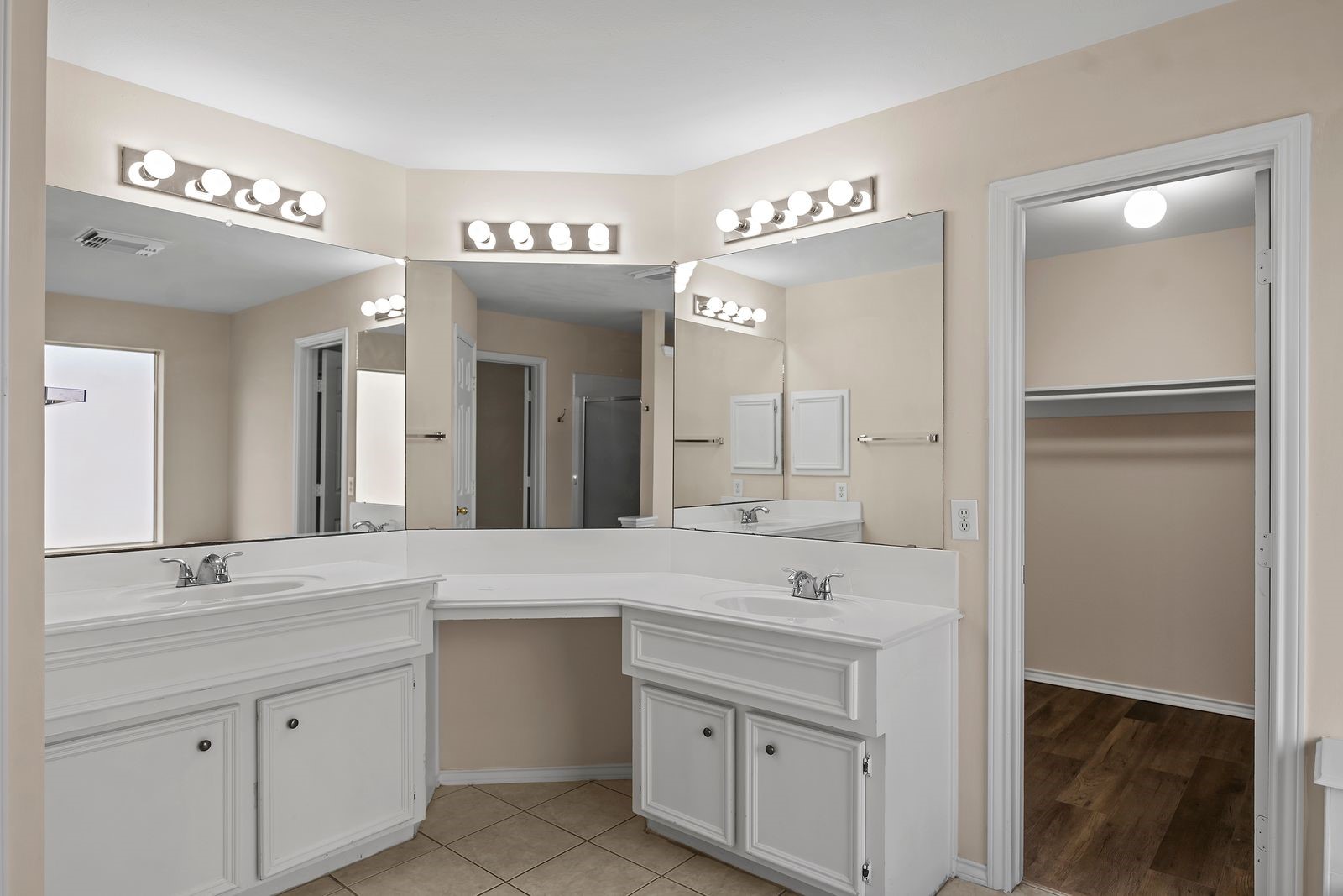 15311 Redbud Berry Way Cypress, TX 77433 - Photo 15 of 30 a spacious bathroom with a shower sink double and mirror