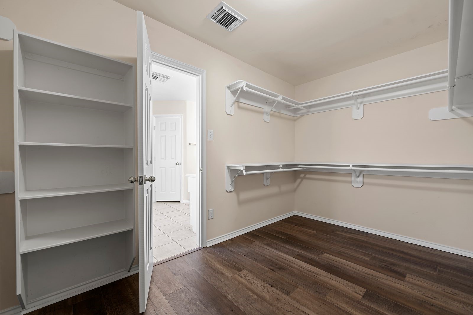 15311 Redbud Berry Way Cypress, TX 77433 - Photo 17 of 30 a view of an empty walk in closet