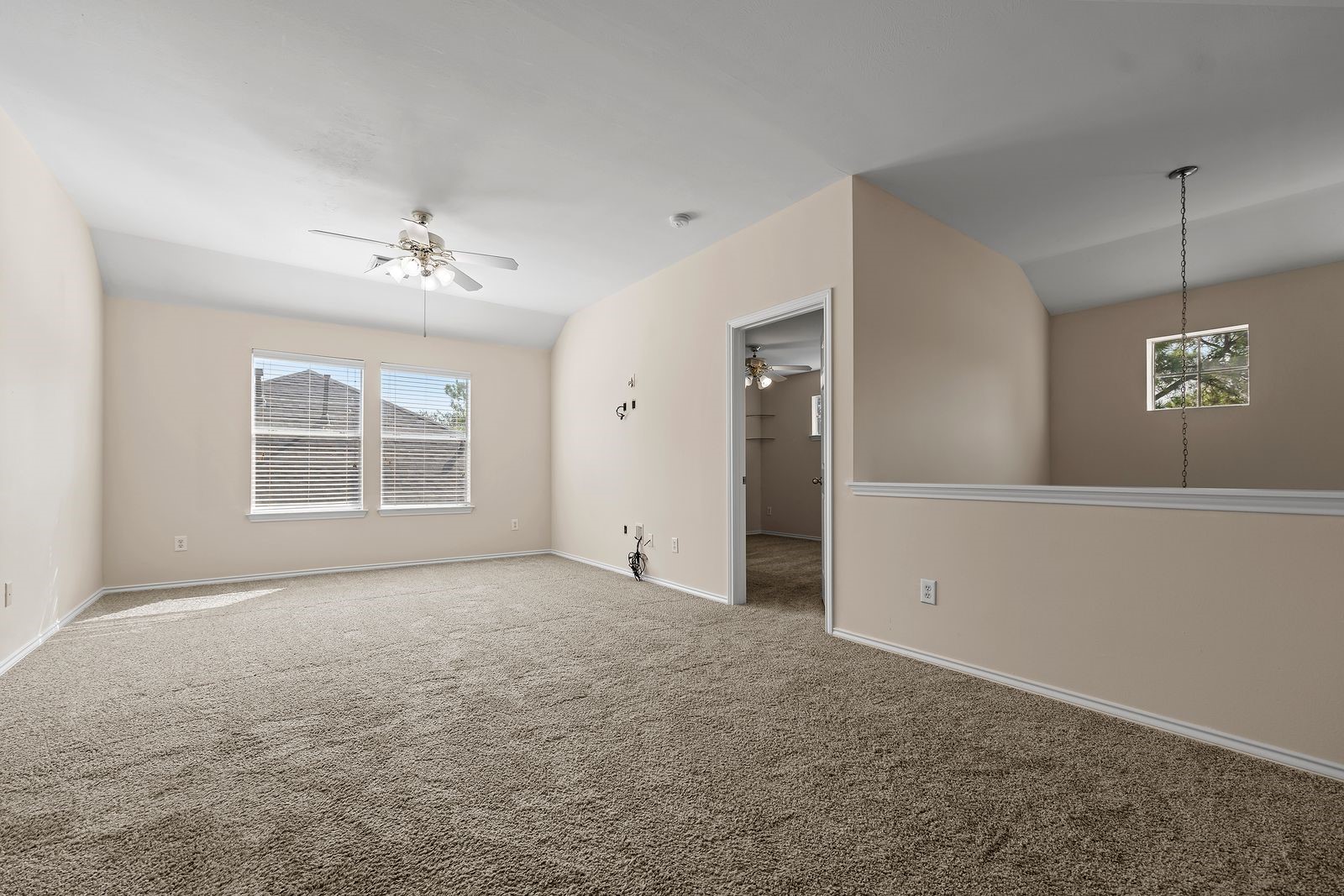 15311 Redbud Berry Way Cypress, TX 77433 - Photo 19 of 30 a view of an empty room with a window