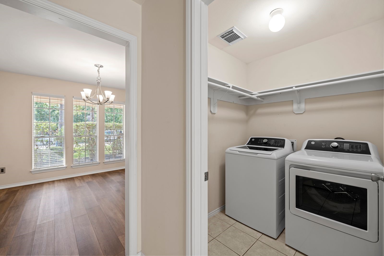 15311 Redbud Berry Way Cypress, TX 77433 - Photo 25 of 30 a open kitchen with a stove top oven