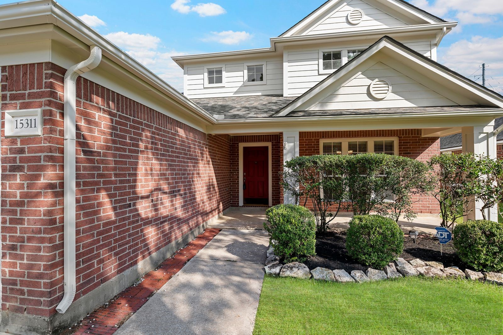 15311 Redbud Berry Way Cypress, TX 77433 - Photo 4 of 30 a front view of a house with a yard