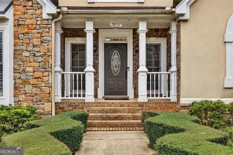 a front view of a house with entryway