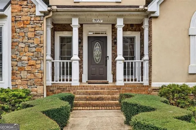 a front view of a house with entryway