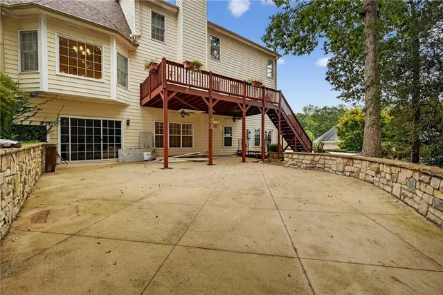 a view of a house with basketball court