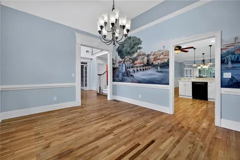 a view of a livingroom with wooden floor