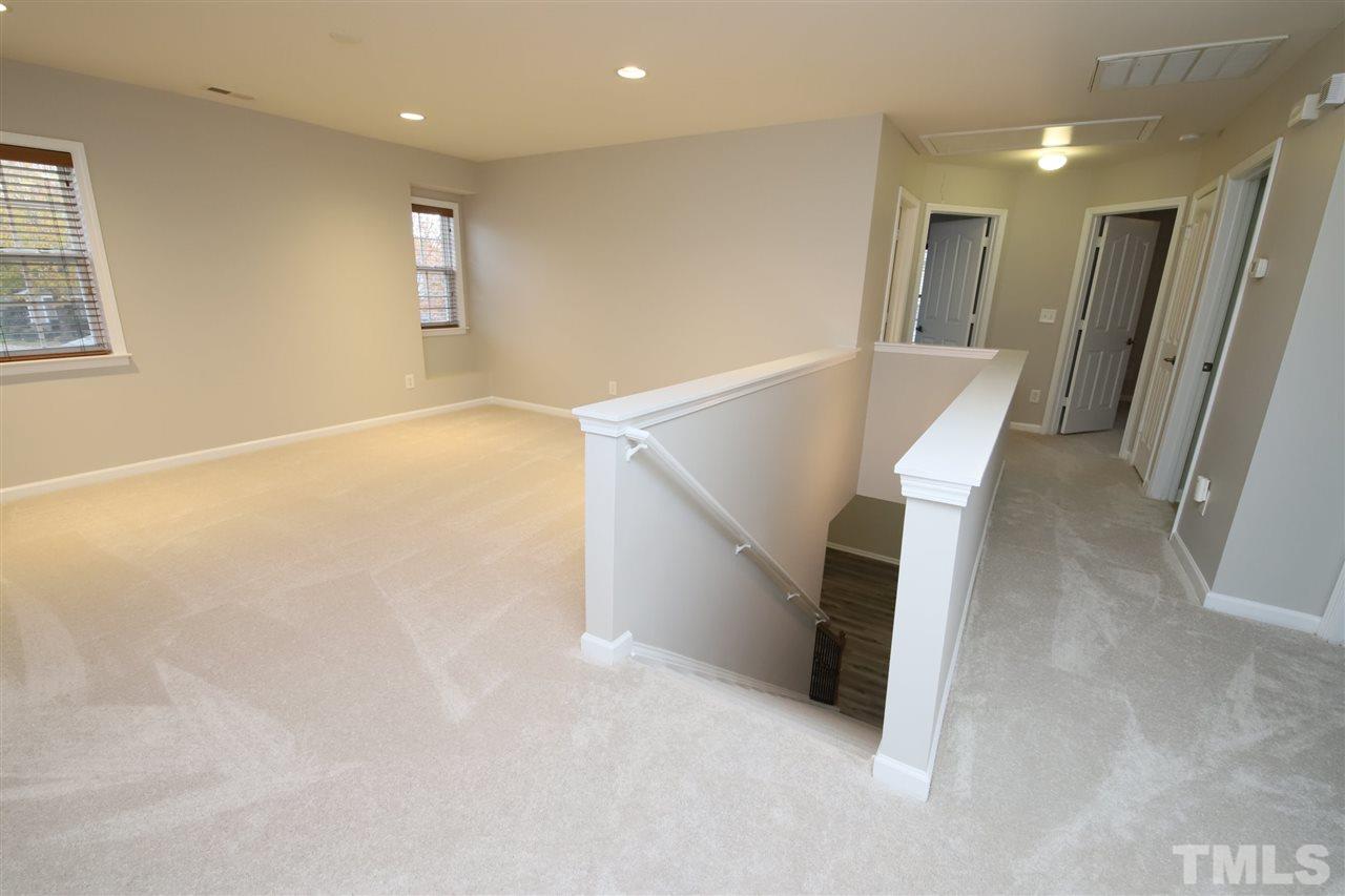 175 Solheim Lane Raleigh, NC 27603 - Photo 11 of 26 en empty room with windows