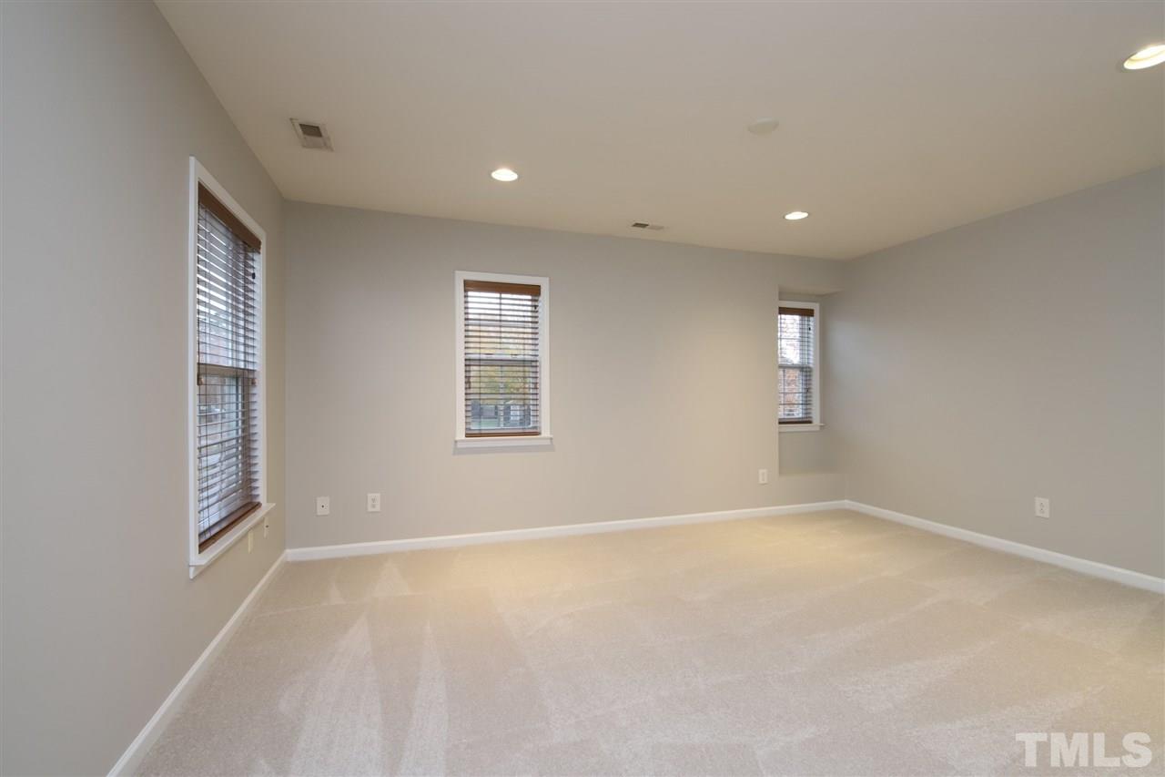 175 Solheim Lane Raleigh, NC 27603 - Photo 12 of 26 an empty room with windows