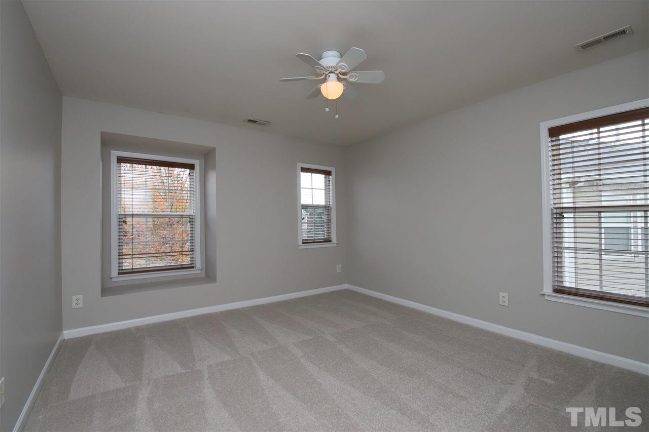 175 Solheim Lane Raleigh, NC 27603 - Photo 14 of 26 a view of an empty room with a window