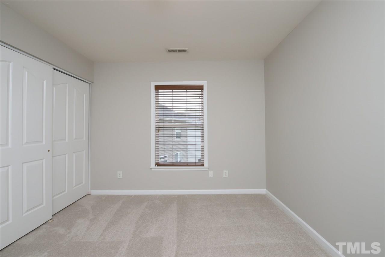 175 Solheim Lane Raleigh, NC 27603 - Photo 15 of 26 an empty room with a window