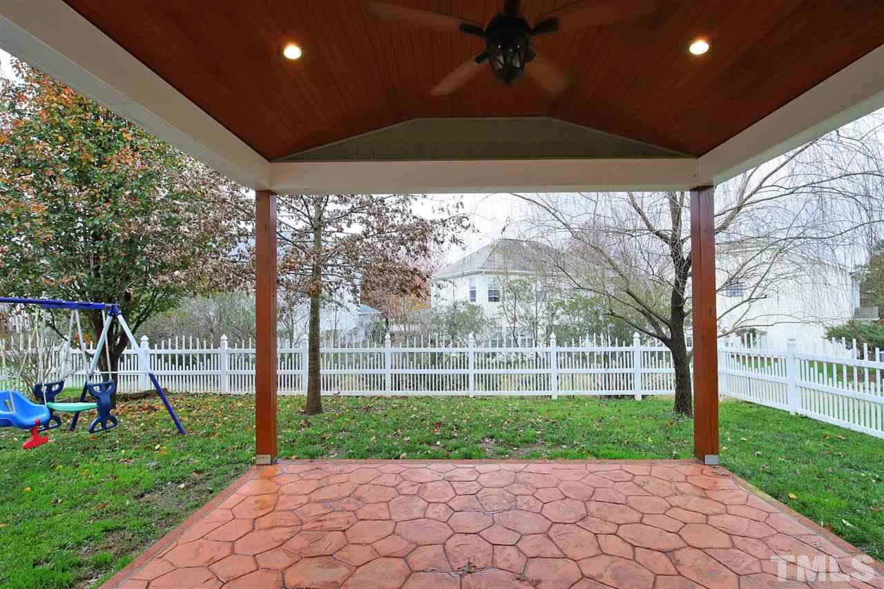 175 Solheim Lane Raleigh, NC 27603 - Photo 17 of 26 a view of a yard with a slide