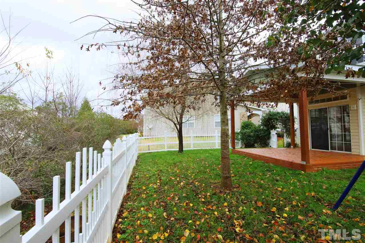 175 Solheim Lane Raleigh, NC 27603 - Photo 19 of 26 a view of a house with backyard and tree