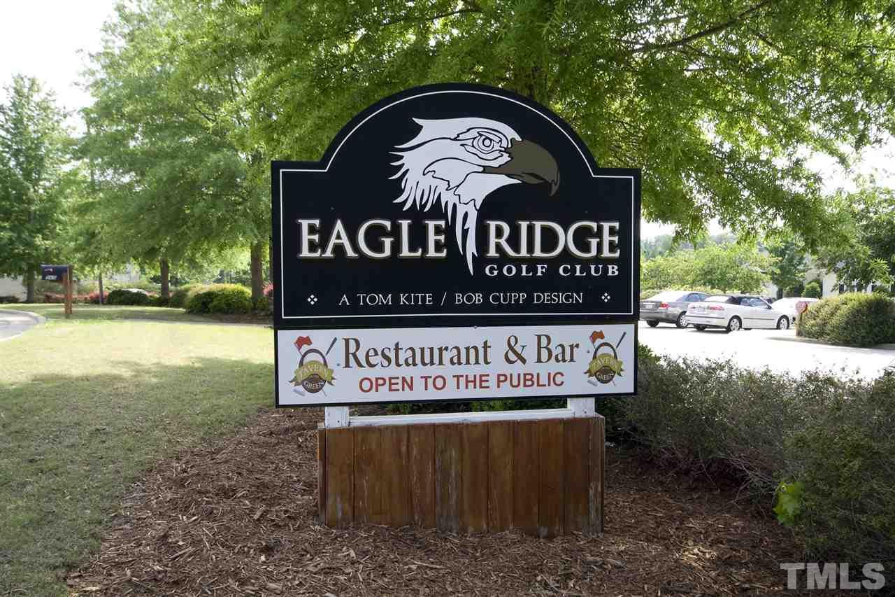 175 Solheim Lane Raleigh, NC 27603 - Photo 25 of 26 a view of outdoor space with signage and flags