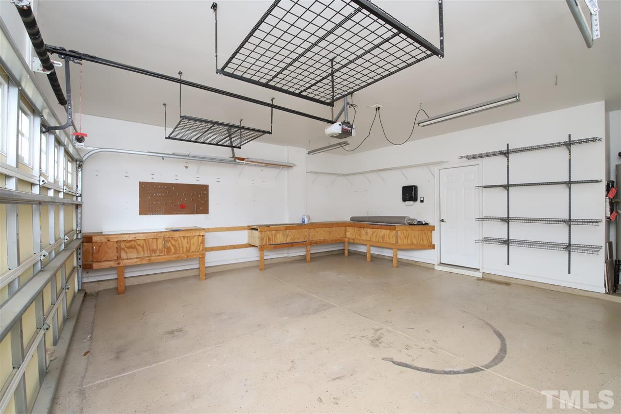 175 Solheim Lane Raleigh, NC 27603 - Photo 10 of 26 a view of a room with racks on the wall